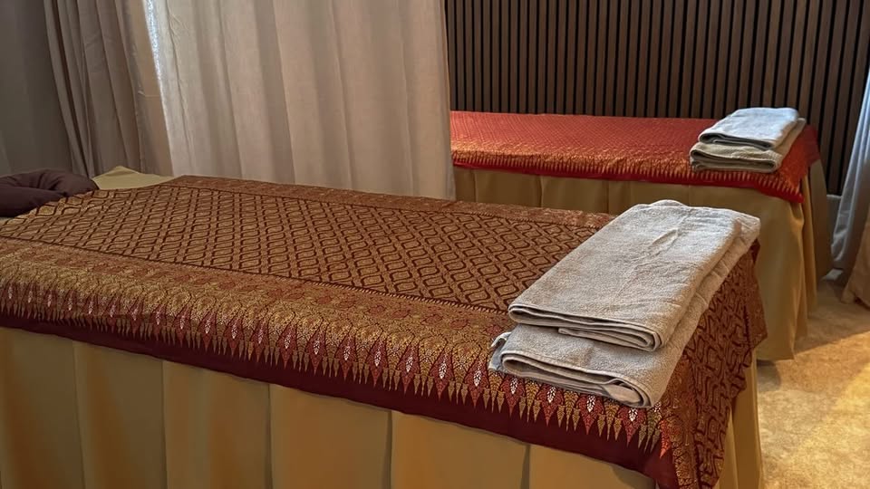 Siam Spa treatment room with traditional Thai massage tables